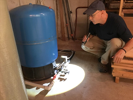 inspecting water tank